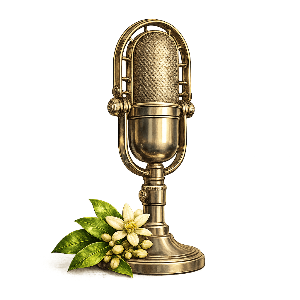 A vintage broadcast microphone adorned with orange blossom flowers — the symbol of NPR's AirTalk coverage of California Citrus Heritage.